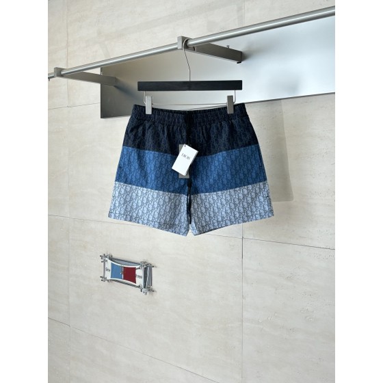 Dio*/ Dior Oblique color-block drawstring beach shorts

Adopting the brand's signature Oblique monogram pattern, it is available in navy blue